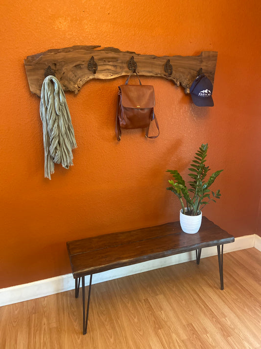 black_walnut_burl_rack_on_orange_wall_with_bench