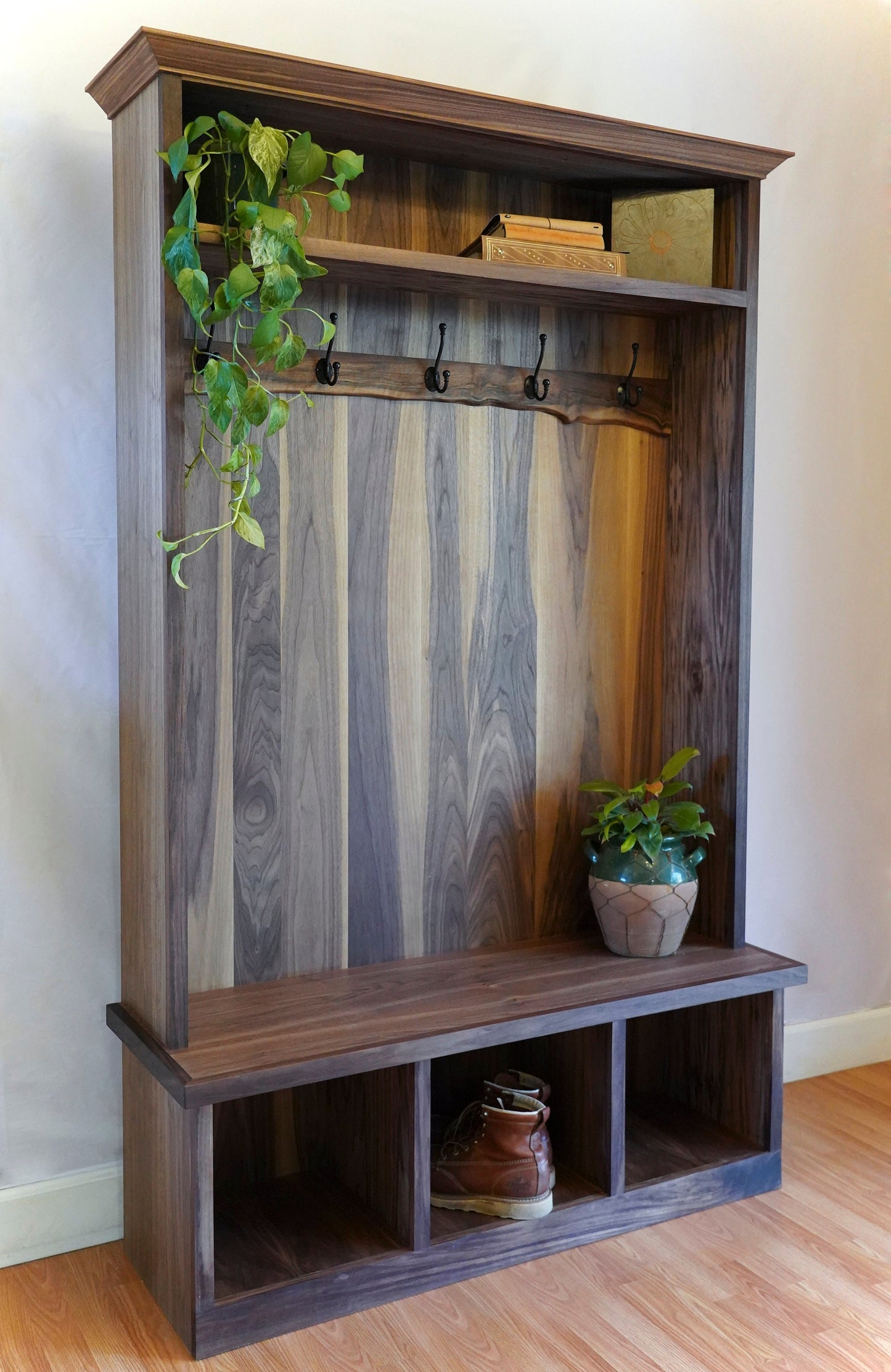 walnut_hall_tree_with_storage_cubbies_and_rustic_back_panel