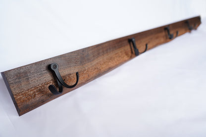 close_up_of_hooks_live_edge_walnut_wood